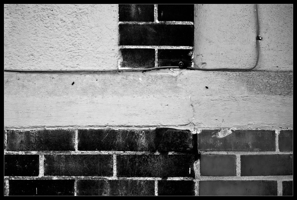 "Outcast", a black and white photo by Robert Santafede.